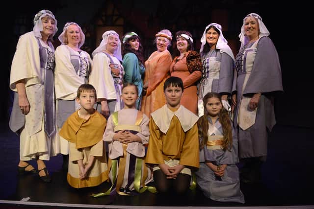 Members of the chorus at Alnwick Theatre Club's 2014 panto, Sleeping Beauty.