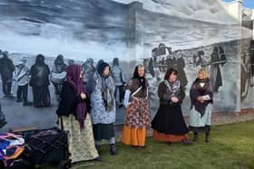 Residents gathered for the unveiling of the mural.