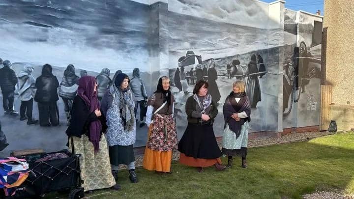 Residents gathered for the unveiling of the mural.