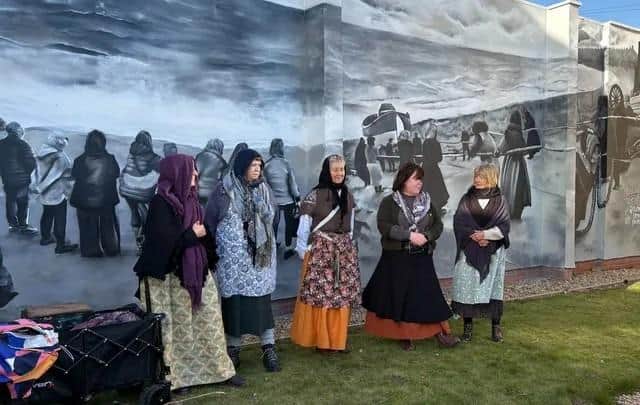 Residents gathered for the unveiling of the mural.