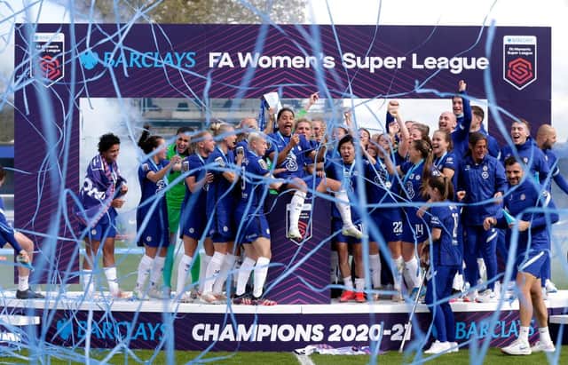 Chelsea lift the Barclays FA Women's Super League Trophy. (Photo by Henry Browne/Getty Images)