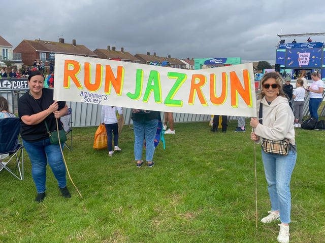 Rachael Ransbury, left, supporting her daughter Jasmine Trinder alongside Lauren Ransbury. What a great banner!