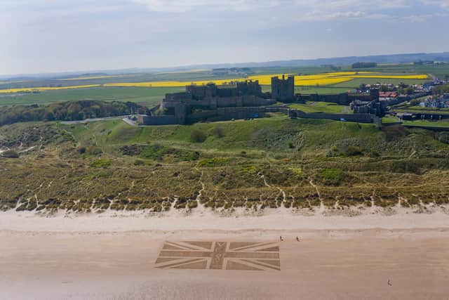 The Union flag beach art at Bamburgh. Picture by Owen Humphreys.