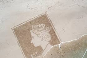 The Queen's stamp portrait at Bamburgh beach. Picture: Claire Eason/Soul 2 Sand