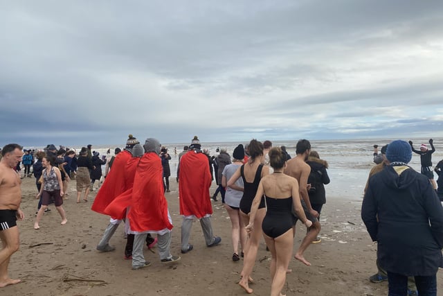 Hundreds braved the dip when the clock hit midday.