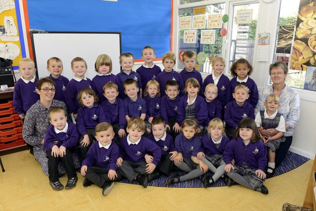 Amy Smith and Anne Payton with Plum reception class at Swansfield Park First School in Alnwick.