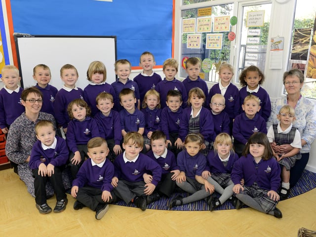 Amy Smith and Anne Payton with Plum reception class at Swansfield Park First School in Alnwick.