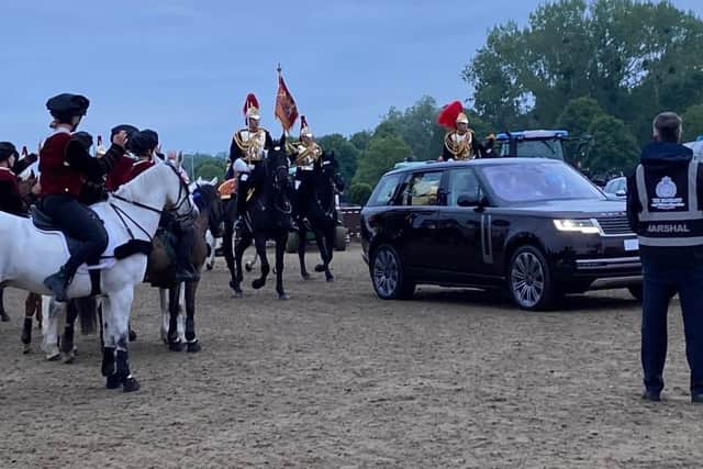 Alice Randall salutes the Queen as she arrives at the Royal Windsor Horse Show.