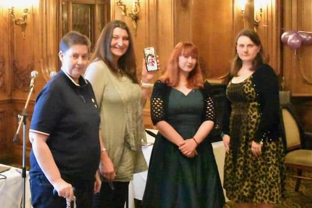 An award was presented to five deserving local women - Gill Ewart, Jane Hardy, Katie Roskams, Gillian Castle (on the mobile) and Rhiannon McGrail.