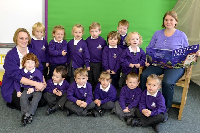 Vanessa Hornsby and Nicola Threlfall with the Pear nursery group at Swansfield Park First School in Alnwick.