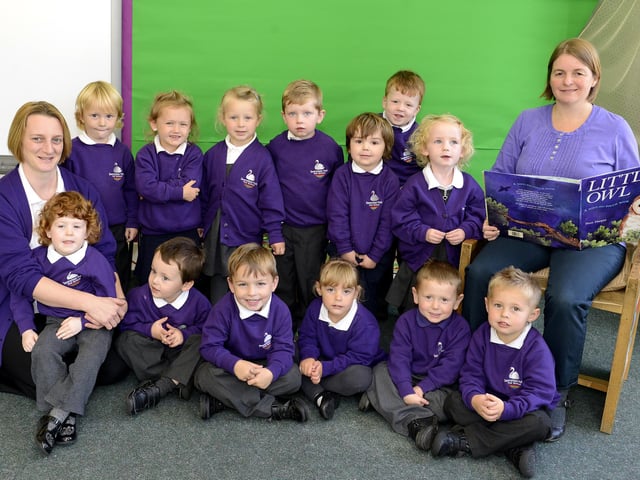Vanessa Hornsby and Nicola Threlfall with the Pear nursery group at Swansfield Park First School in Alnwick.