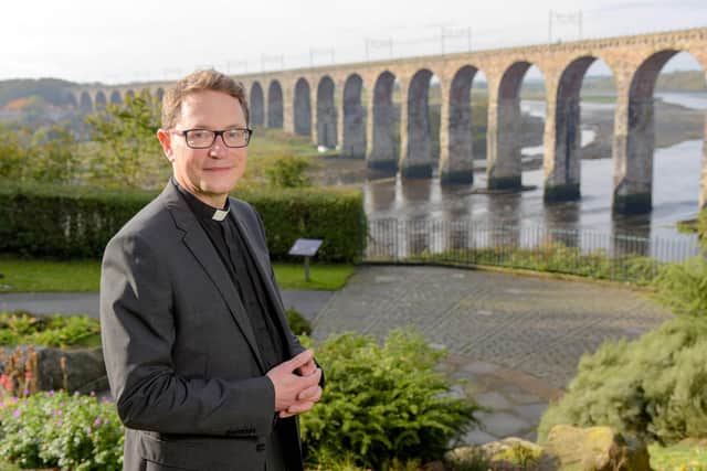 The Venerable Mark Wroe, pictured by the Royal Border Bridge, is the next Suffragan Bishop of Berwick.