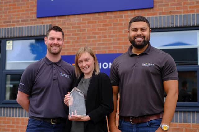 (L-R) Liam Holliday, Vicki Smith and Luke Olabode, from TruStack, with the EMEA Partner of the Year Award.