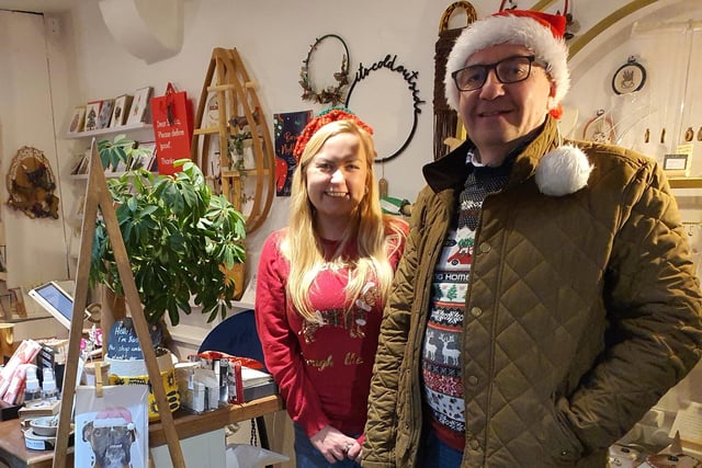 Stephen Scott with Abbi Kewin, owner of puddles, following the theme 'Jumper into Christmas'.