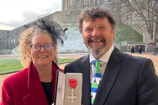 Ken Dunn, pictured with his wife, Karen, after receiving his MBE.