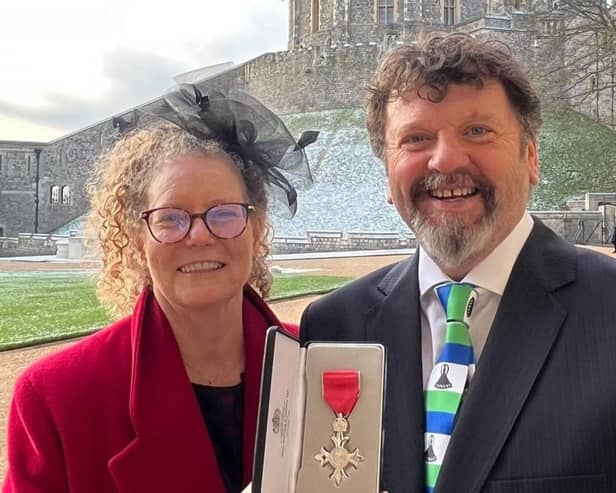 Ken Dunn, pictured with his wife, Karen, after receiving his MBE.