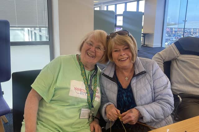 Mary Duncan and visitor Patricia at one of the knitting events.