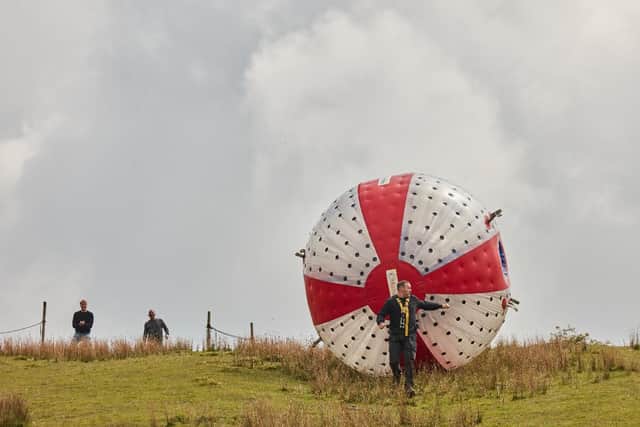 The episode features a Zorb-ball hill climb. Picture: BBC