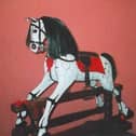 The rocking horse.