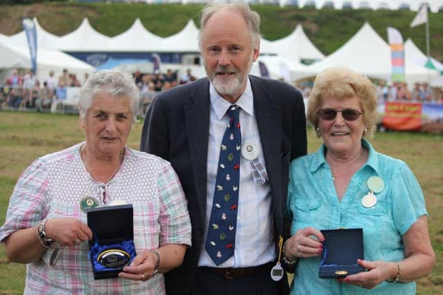 Long service awards were presented to Caroline Cummings and Betty Nevins by show president Lord Joicey.