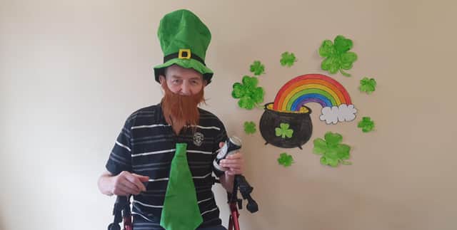 A resident at Chester Court care home enjoys the St Patrick's Day celebrations.