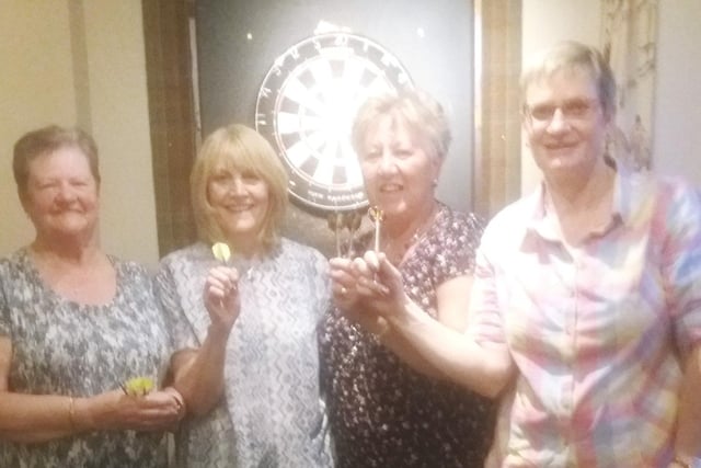 Craster WI are champions. Their darts team, Pauline Brown, Sheila Dixon, Shirley Tucker and Viv Wilson triumphed against Stocksfield WI in the final of the Northumberland Federation darts tournament in 2017.