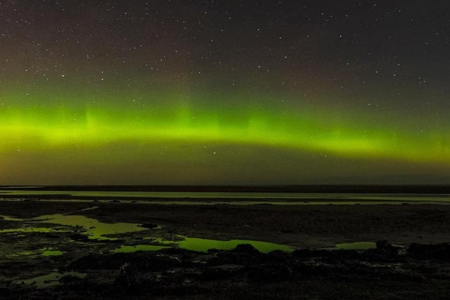 The Northern Lights seen at New Year on Holy Island.