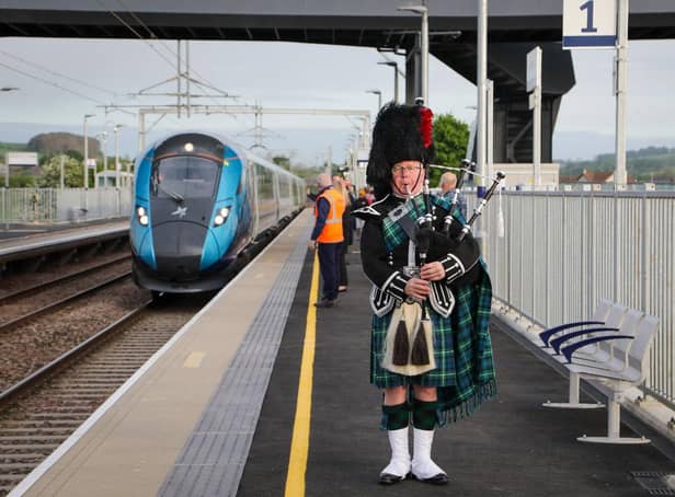Sandy Mutch, the Border Piper, welcomes in the 6.16am TransPennine Express service to Reston Station.