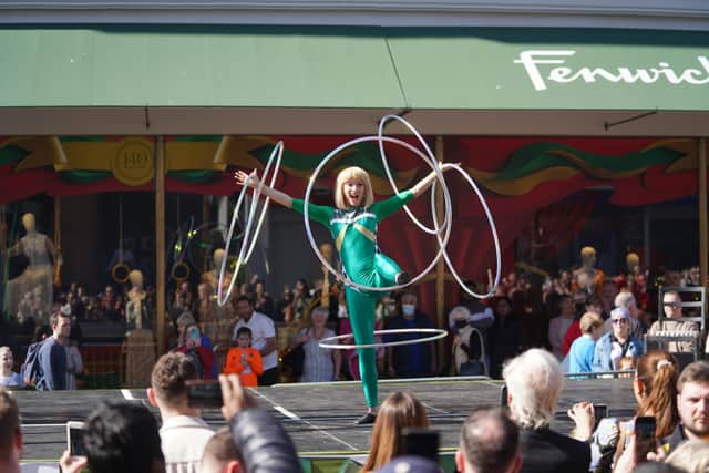 Hula Hoopist Satya performs for Fenwick 140 to mark the start of a year of celebrations