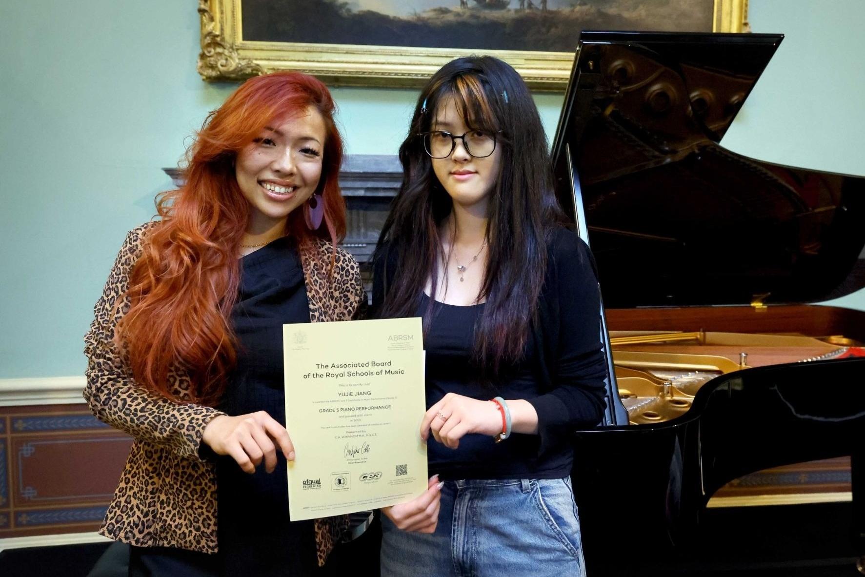 International musician presents award to talented young Berwick pianist
