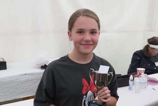 The Hibbs Cup for 12 - 16 year olds was won by G Dollin. She also won the Children's Section for Vegetables aged 9 - 13 year olds and for this was awarded the N H Hogg Memorial Trophy. Picture: Dave Dyer.