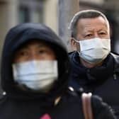 Tourists in Edinburgh continue to take precautions and wear masks due to the coronavirus outbreak