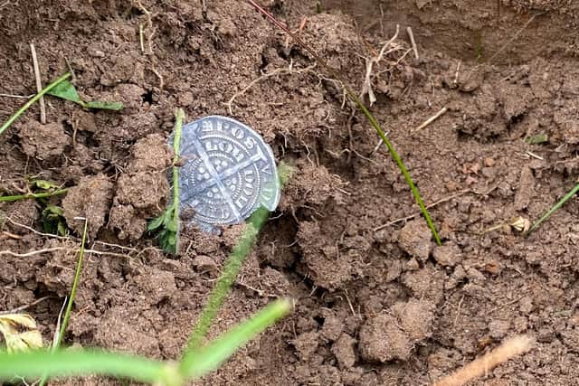 The 670-year-old coin found among a pile of rubbish while searching land near Rothbury.