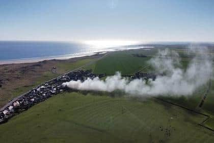 A drone image of a fire in Bamburgh.