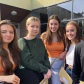 Students at King Edward VI School in Morpeth celebrate their GCSE results.