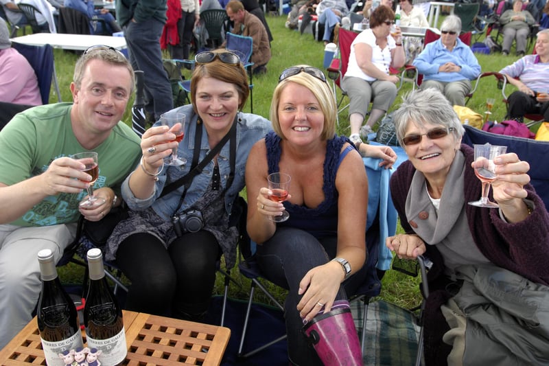 Vincent and Sarah Morris with Alison Munro and Kathleen Davison get into the spirit of the occasion at the Jools Holland  2010 concert in Alnwick pastures.