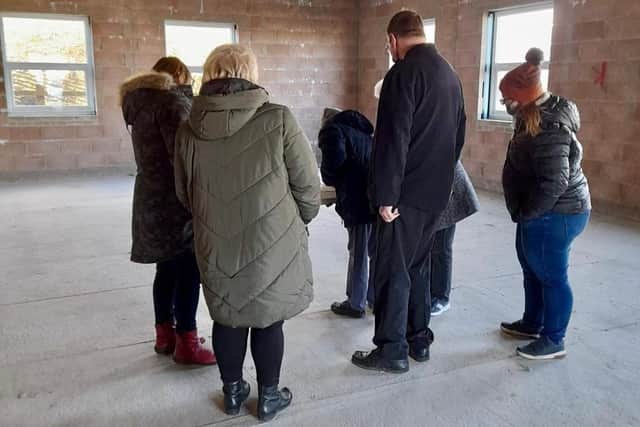A group of members and staff have had a look around the new premises.