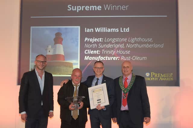 Ian Williams Ltd receiving their award.
