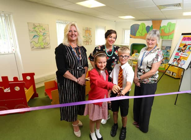 Maureen Taylor, interim executive director of education at Northumberland County Council, illustrator, Liz Million and Alison Peaden, head of service for libraries with pupils from St Bede’s Catholic Primary School at the official launch of Bedlington Library and Community Hub.