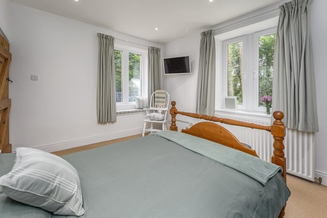 Another double bedroom with views of the garden.