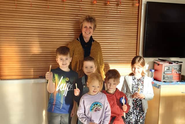 Scremerston First School headteacher Sarah Smith and some of the children with their new bamboo toothbrushes.