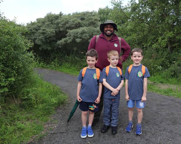 Ranger Hamza and the ramblers go on an 'eco quest' in Northumberland. (Photo by BBC Studios)