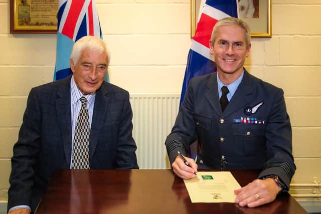 Adrian Hinchcliffe of Longhoughton Parish Council and RAF Boulmer Group Captain David Keighley.
