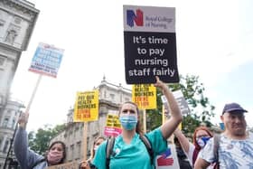 Members of NHS staff and their supporters march in protest about NHS pay in July last year. Picture: Niklas Halle'n/AFP via Getty Images.