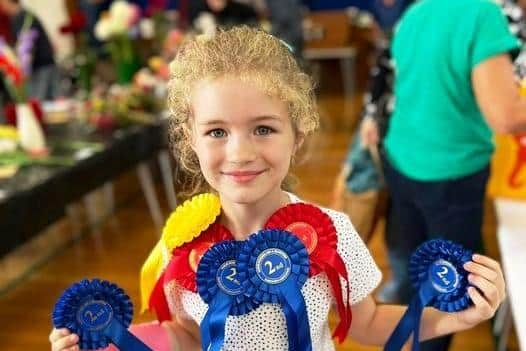 Rosie with her rosettes.
