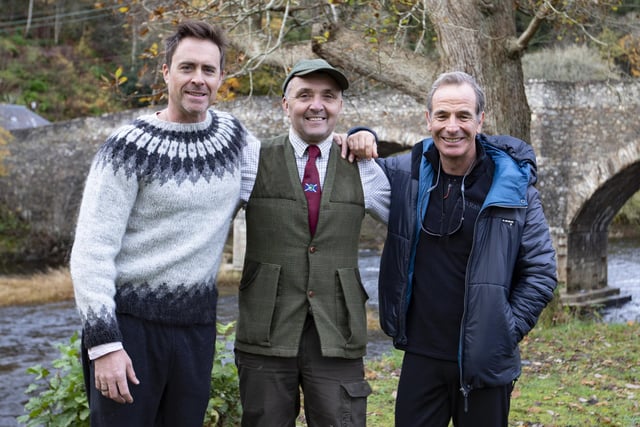 Actors James Murray and Robson Green with Ghillie Mark Hislop salmon fishing in the Tweed.