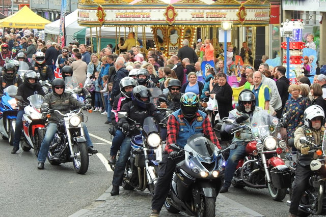 There were plenty of classic motorbikes in the parade as well.
