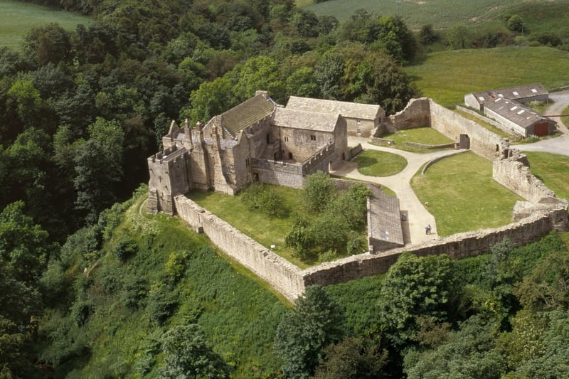 Aydon Castle is set in secluded woodland a mile from the village of Corbridge. Almost completely intact, it is one of the finest and most unaltered examples of a 13th century fortified English manor house.