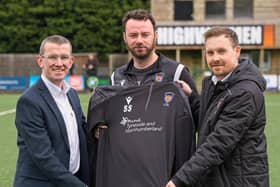 From left: Chris Brown, Craig Lynch and Ross Jackson with the new top. Picture: George Davidson