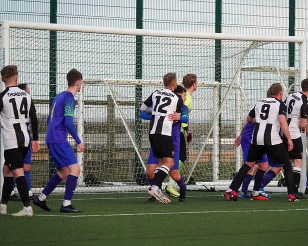 Goalmouth action from Alnwick Town's Challenge Cup semi-final against Newbiggin. Picture: Alnwick Town